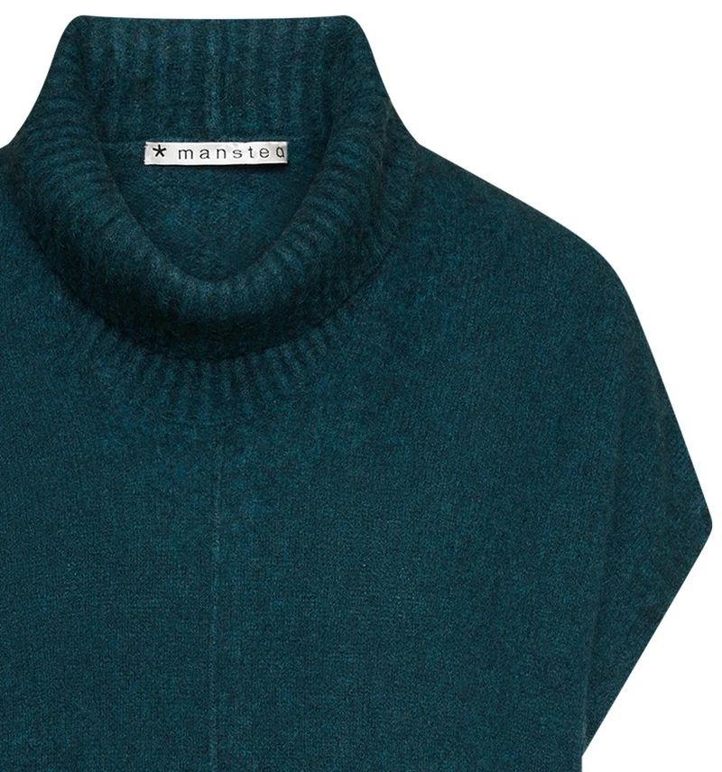 Kleurrijke, creatieve en unieke mode voor vrouwen in Gent. Grote maten mode dames kledij en accessoires voor vrouwen met een maatje meer of minder. Debardeur Zo Bee in kleur emerald van Mansted. Pull met korte mouwen en grote col kraag in zachte en warme, hypoallergene yak wol.